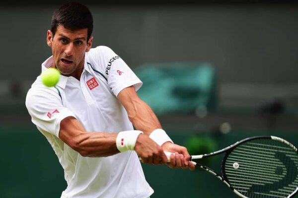 Novak Djokovic with a tennis racket before hitting the ball