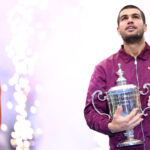 Carlos Alcaraz and Yannick Sinner with US Open trophies