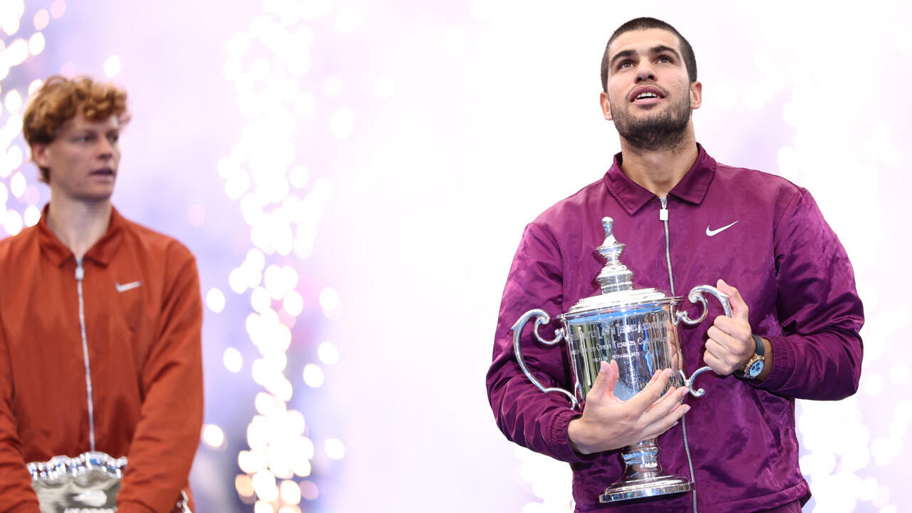Carlos Alcaraz and Yannick Sinner with US Open trophies